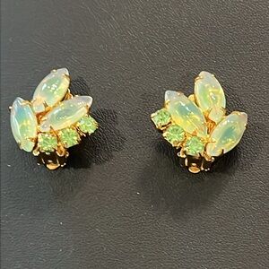 Exquisite Vintage Clip On Earrings. Unsigned. Gold tone Prong set Stones.